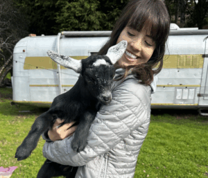 Kendall Sooter holding a goat